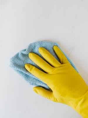 Wear gloves before removing mold from fabrics